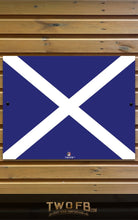 Load image into Gallery viewer, Blue flag with white cross on a wooden background, featuring the brand 'TWOFB'.