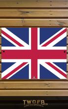 Load image into Gallery viewer, Union Jack flag on a wooden background with 'TWOFB' branding.