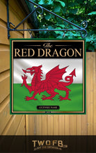 Load image into Gallery viewer, Sign featuring a red dragon on a green and white background, hanging against a wooden wall.
