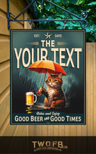 Load image into Gallery viewer, Decorative sign with a cat holding an umbrella and a beer, text customizable, brand 'TWOFB' visible.