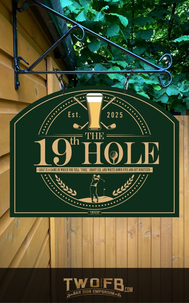 Green sign with 'The 19th Hole' logo and branding on a wooden wall.