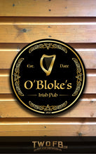 Load image into Gallery viewer, Round sign for O&#39;Bloke&#39;s Irish Pub on a wooden background
