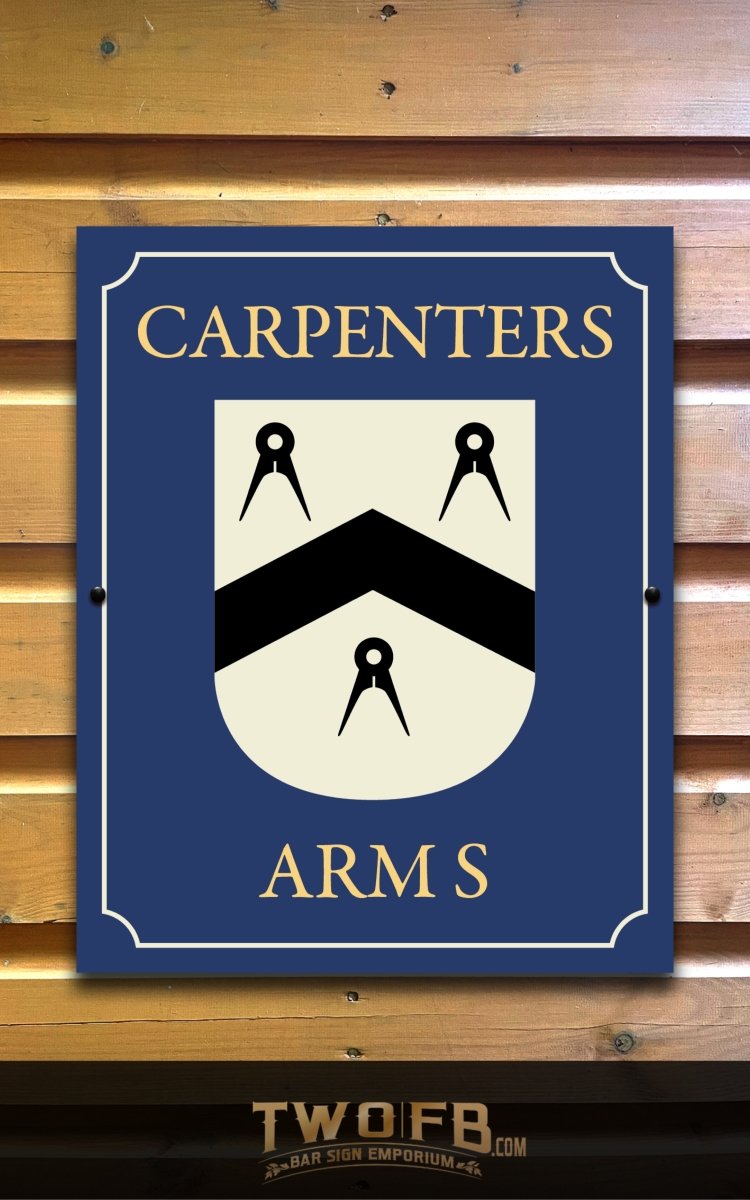 Sign with 'Carpenters Arms' and a crest on a wooden background