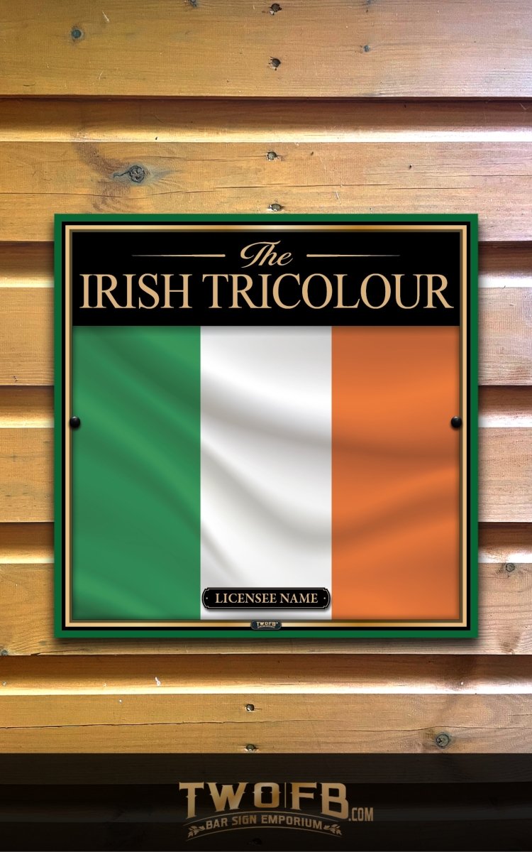 Irish Tricolour flag in a frame on a wooden background