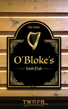 Load image into Gallery viewer, Decorative sign for O&#39;Bloke&#39;s Irish Pub with a harp on a wooden background
