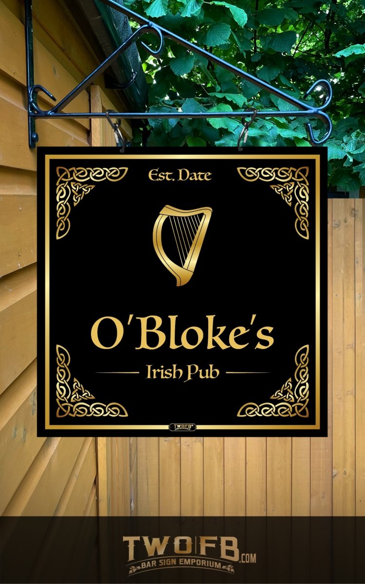 Decorative sign for O'Bloke's Irish Pub with a gold harp design on a black background.