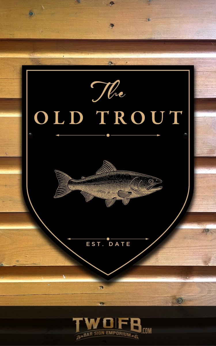 Decorative sign with 'The Old Trout' logo on a wooden background