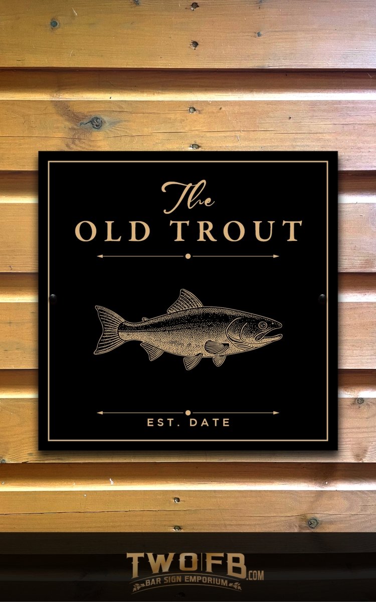 Decorative sign with 'The Old Trout' logo on a wooden background