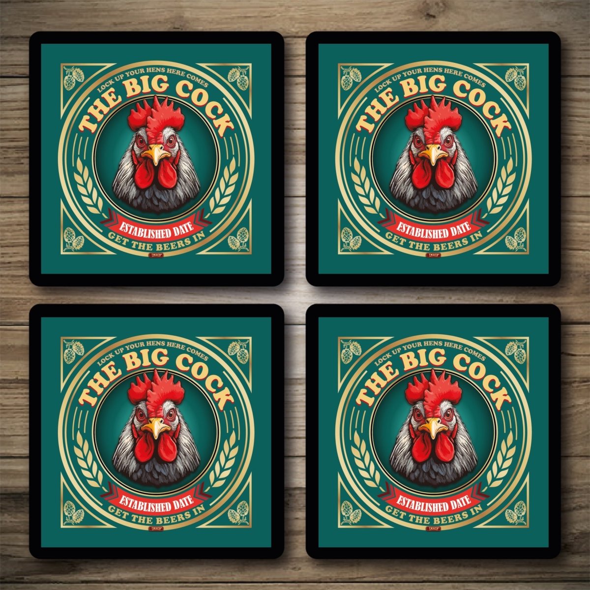 Four identical coasters with a rooster illustration and 'The Big Cock' text on a wooden surface.