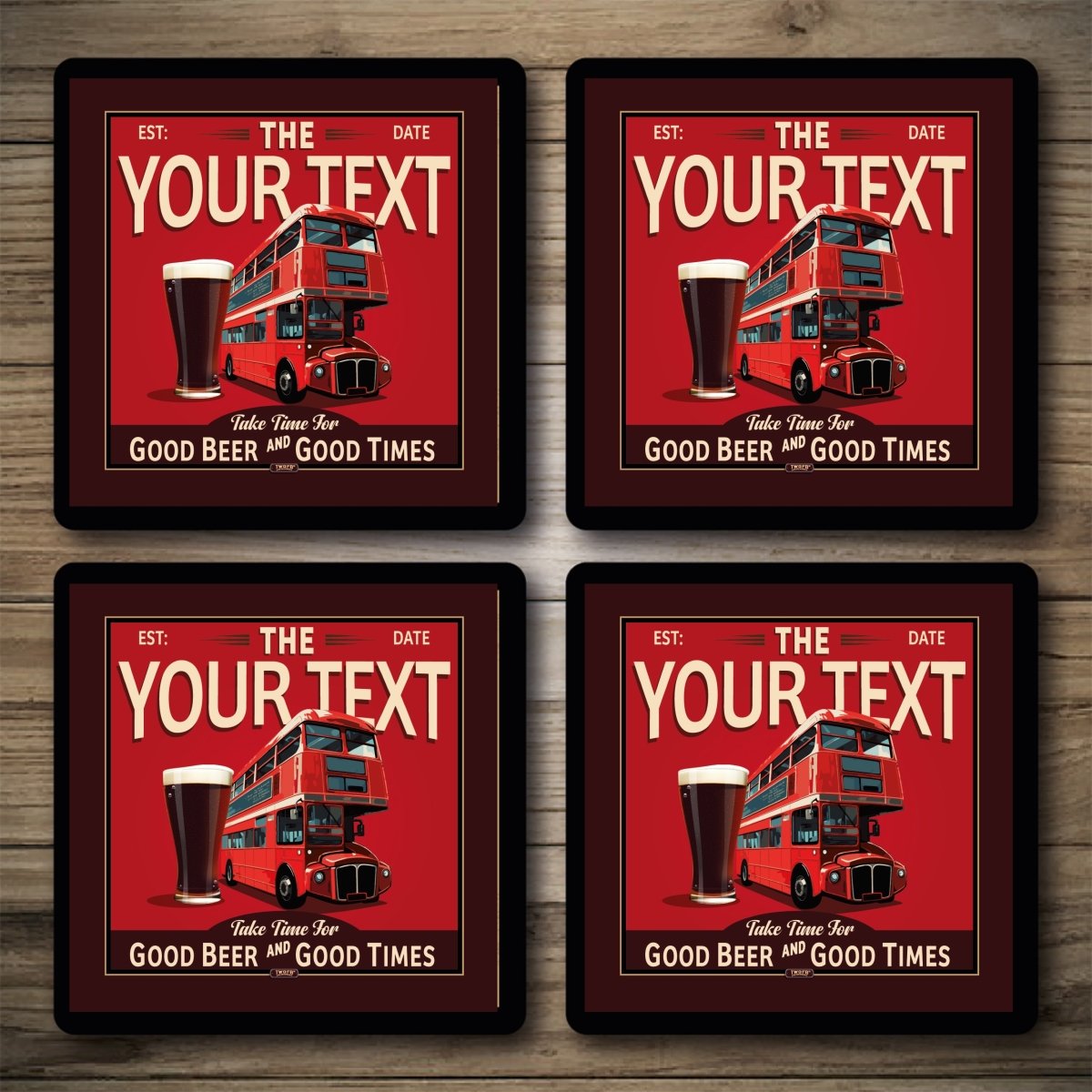 Four red coasters with a red double-decker bus and beer glass design on a wooden surface.