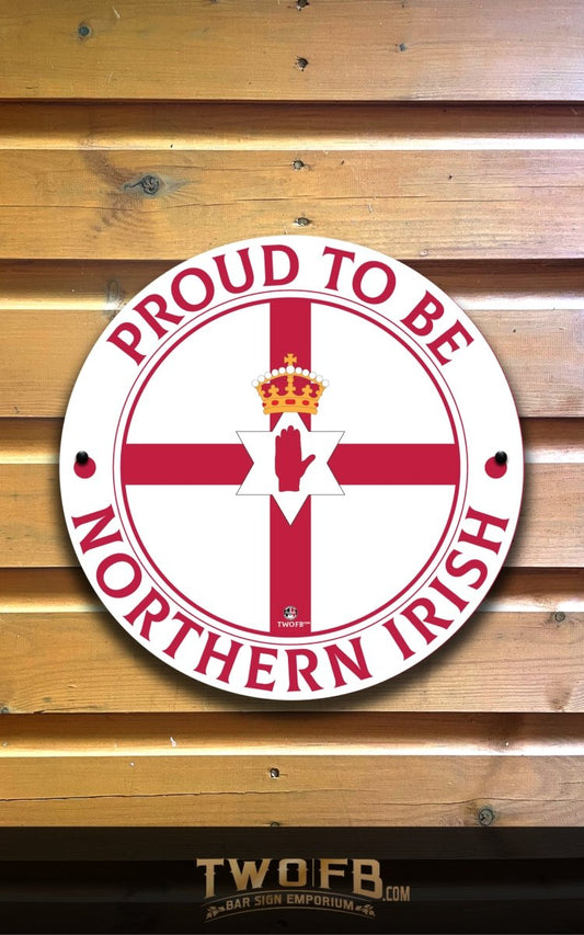 Circular sign with 'Proud to be Northern Irish' text on a wooden background