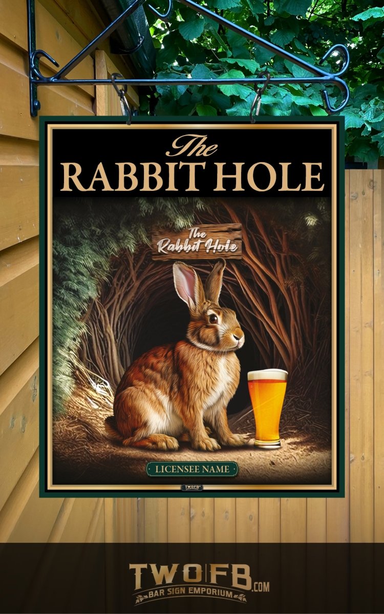Decorative sign for 'The Rabbit Hole' with a rabbit and beer glass, hanging outdoors.