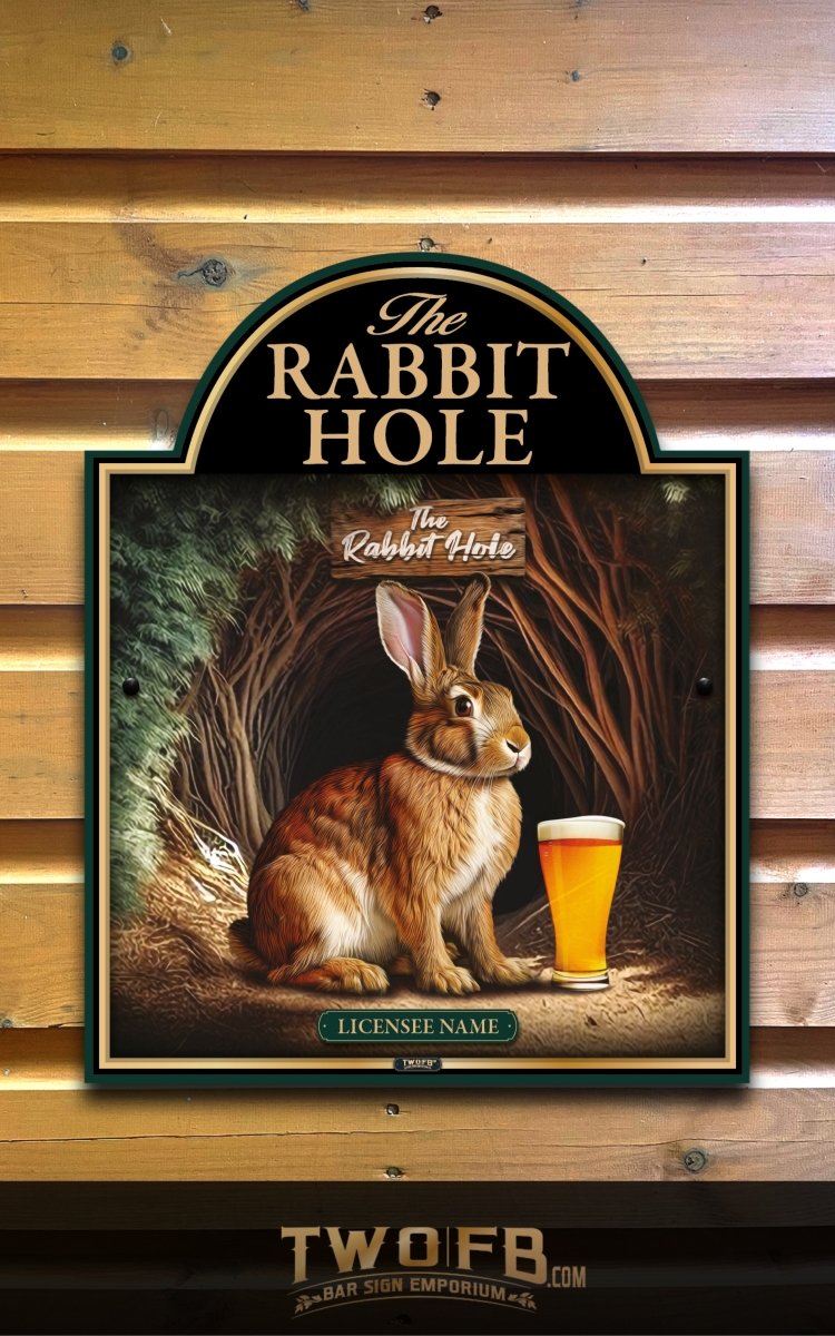 Decorative sign featuring a rabbit with a beer and 'The Rabbit Hole' text on a wooden background.