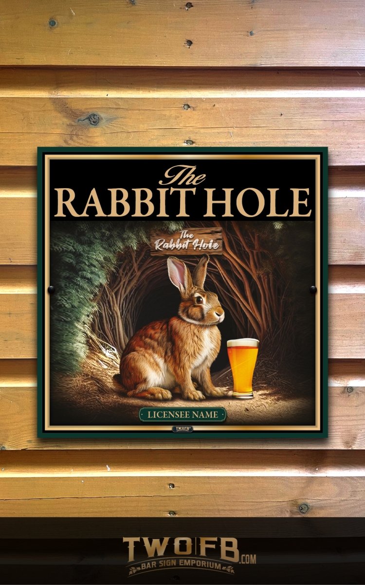 Poster of a rabbit with a beer mug titled 'The Rabbit Hole' on a wooden wall.