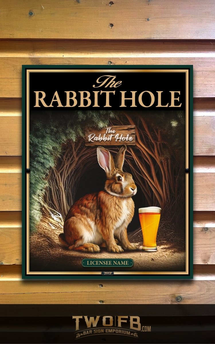 Poster of a rabbit with a beer next to a sign that reads 'The Rabbit Hole' on a wooden background.