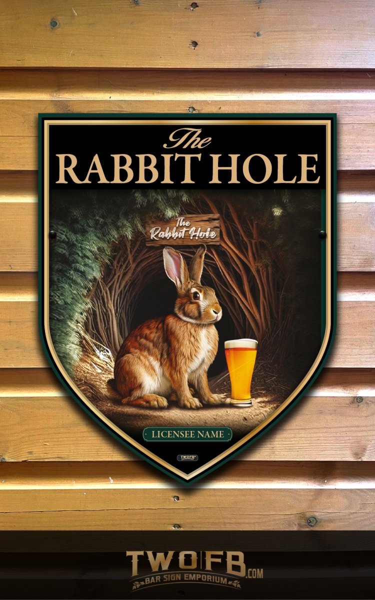 Decorative sign for 'The Rabbit Hole' with a rabbit and beer on a wooden background