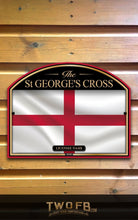 Load image into Gallery viewer, St George&#39;s Cross flag in a decorative frame on a wooden background
