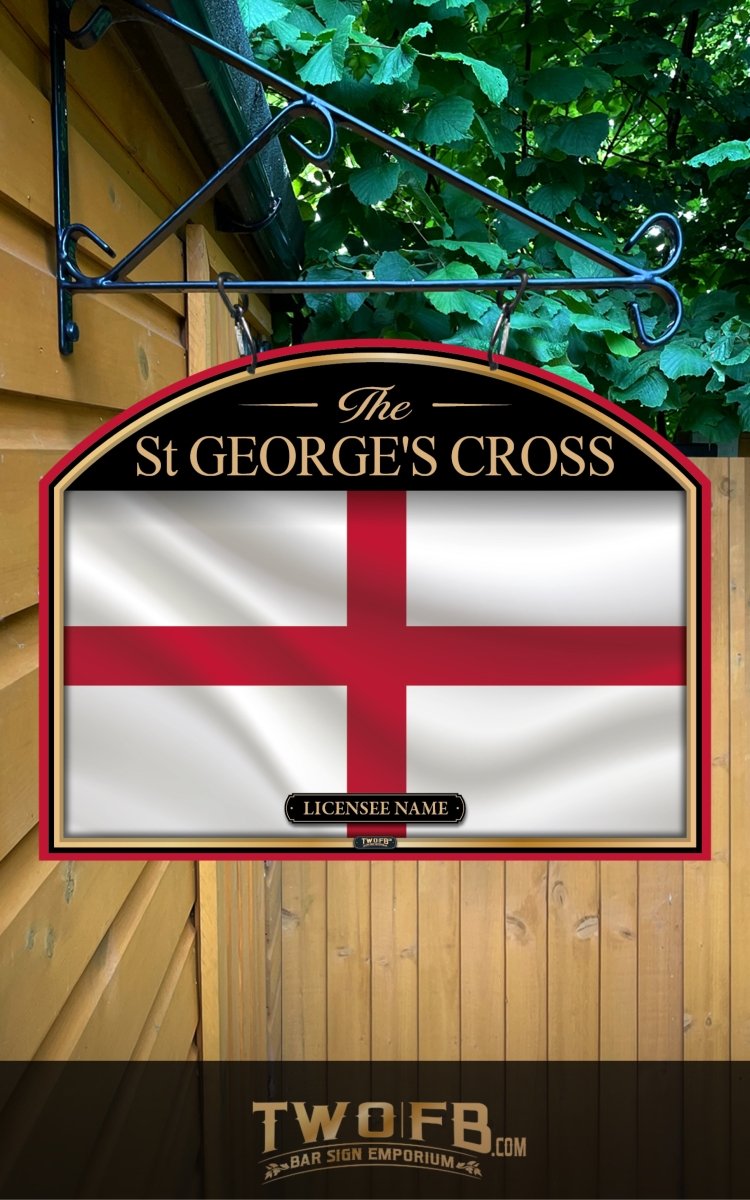 Sign with St George's Cross design hanging on a wall with greenery in the background