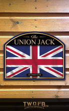 Load image into Gallery viewer, Union Jack sign on a wooden background
