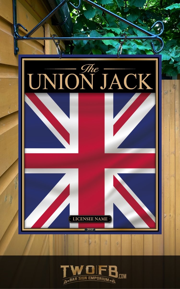Union Jack sign with 'The Union Jack' text and TwofB logo on a wooden background