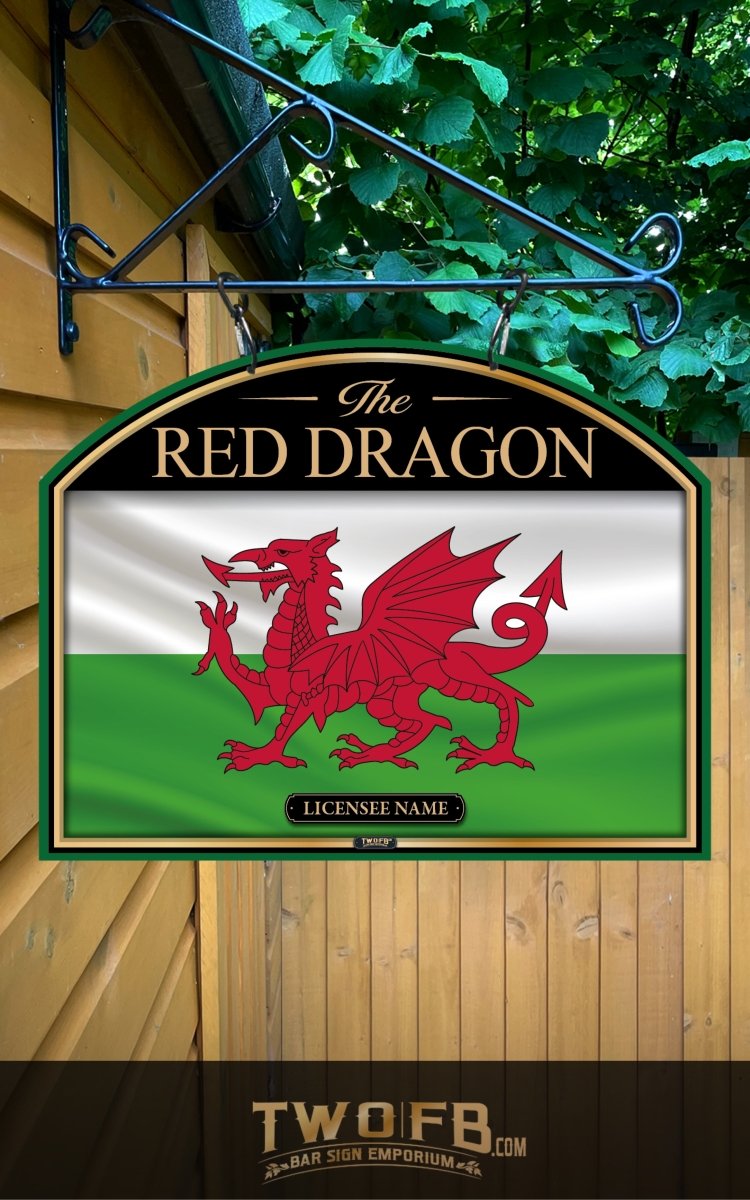 Sign with red dragon emblem and 'The Red Dragon' text, hanging against a wooden wall with greenery.